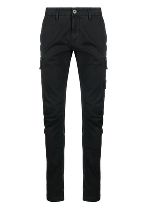 Stone Island stretch-cotton tapered-leg trousers - V0129