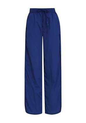 Osklen perforated track pants - Blue