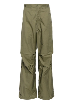 Maharishi x Jean-Michel Basquiat wide-leg trousers - Green