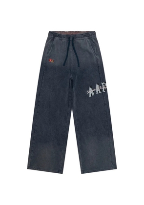 AAPE BY *A BATHING APE® drawstring appliqué trousers - Blue