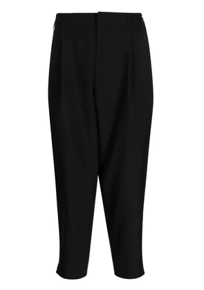 Black Comme Des Garçons tapered-leg cropped wool trousers