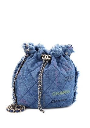 CHANEL Pre-Owned Denim Mood Chain Logo Printed Quilted Fringe Denim Medium bucket bag - Blue