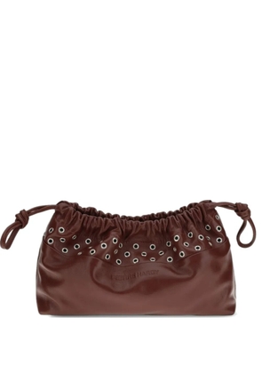 Pierre Hardy Twin eyelets drawstring leather clutch bag - Red