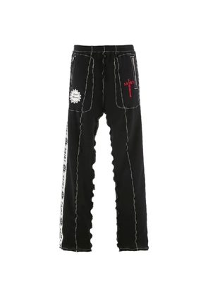 SAINT MXXXXXX x A Love Moment seam-detail trousers - Black