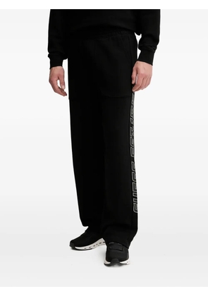 GUESS USA logo-detail track pants - Black