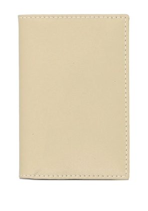 Comme Des Garçons Wallet logo-embossed leather wallet - Neutrals