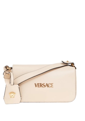 Versace mini Tag logo charm crossbody bag - Neutrals