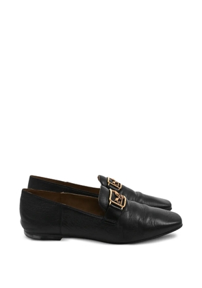 Hermès Pre-Owned plaque-embellished flat shoes - Black