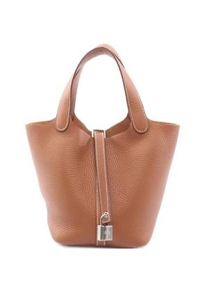 Hermès Pre-Owned 2025 Picotan Lock PM leather lock tote bag - Brown