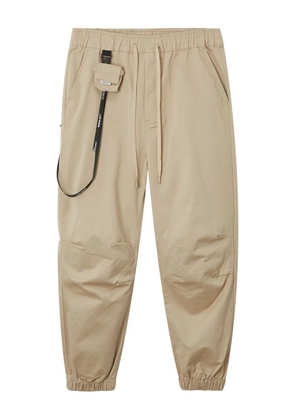 Musium Div. elasticated drawstring trousers - Neutrals