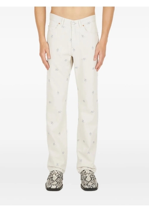 Martine Rose floral-embroidered jeans - White