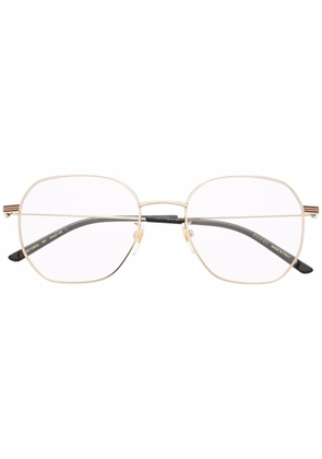 Gucci Eyewear GG1125O round-frame glasses - Gold