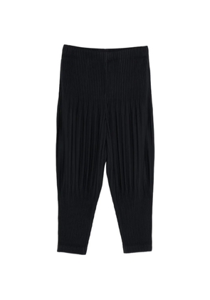 Homme Plissé Issey Miyake elasticated-waistband tapered trousers - Black