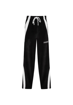 AMIRI logo-embroidered track pants - Black