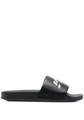 VETEMENTS logo-print slides - Black