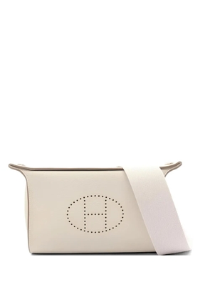 Hermès Pre-Owned 2023 Videpoches perforated-logo leather cross body bag - Neutrals