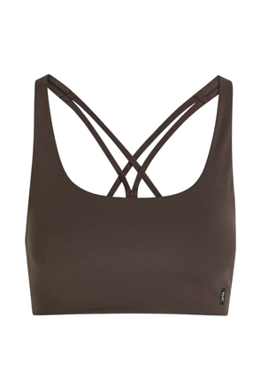 On brown sports bra