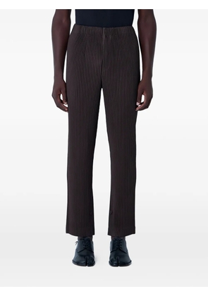 Homme Plissé Issey Miyake pleated elasticated-waist straight-leg trousers - Brown