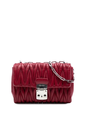 Miu Miu Pre-Owned 2010-2025 Matelasse Lambskin Flap crossbody bag - Red