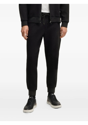 BOSS logo-engraved track pants - Black