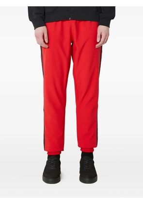 adidas three-stripe track pants - Red