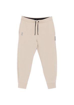 On drawstring track pants - Neutrals