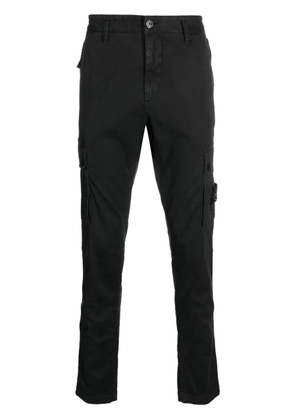 Stone Island Compass-motif cotton tapered trousers - Black