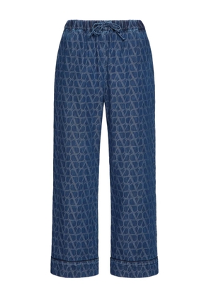Valentino Garavani jacquard-logo cropped trousers - Blue