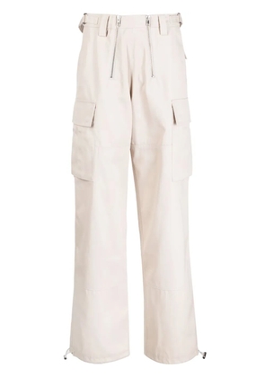 GmbH logo-patch chino trousers - Neutrals