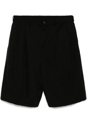 Black Comme Des Garçons tailored shorts