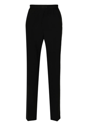 MSGM logo-waistband tapered trousers - Black
