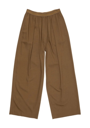 Acne Studios logo-tape trousers - Brown