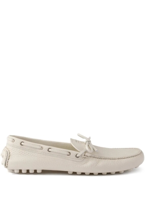 Prada tie logo-detail boat shoes - Neutrals