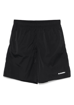Jil Sander + logo-print swim shorts - Black