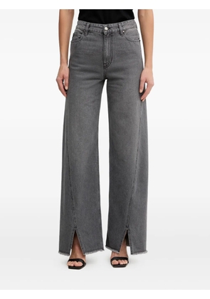 SIMONA CORSELLINI frayed split jeans - Grey