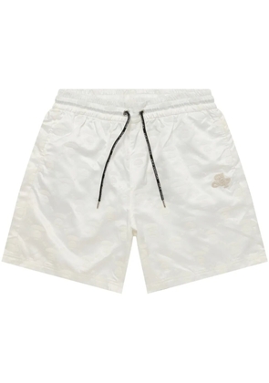A BATHING APE® logo-embroidered track shorts - White