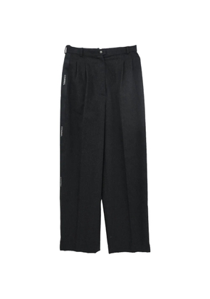 CHANEL Pre-Owned 1990-2000s logo-tape trousers - Black