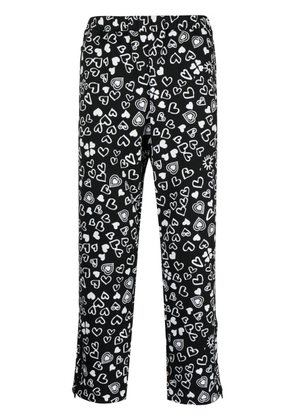 Black Comme Des Garçons heart-print cropped trousers