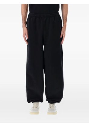 Arte Antwerp logo-print track pants - Black