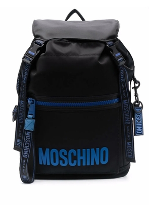 Moschino embossed-logo backpack - Black