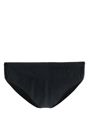 Moschino rear logo-print swim trunks - Black