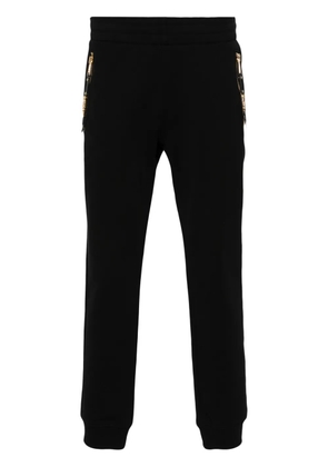 Moschino logo-lettering cotton track pants - Black