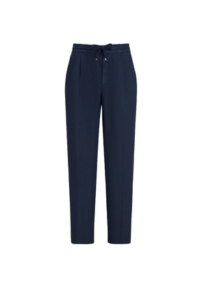 Brunello Cucinelli garment-dyed trousers in linen gabardine with drawstring and double pleats - Blue