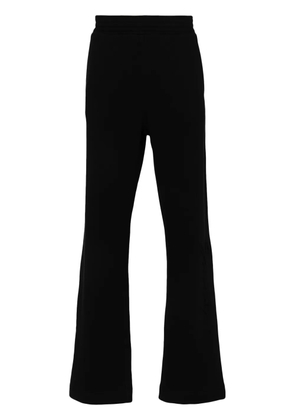 Givenchy logo-embossed track pants - Black