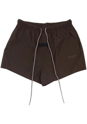 FEAR OF GOD ESSENTIALS logo-appliqué track shorts - Brown