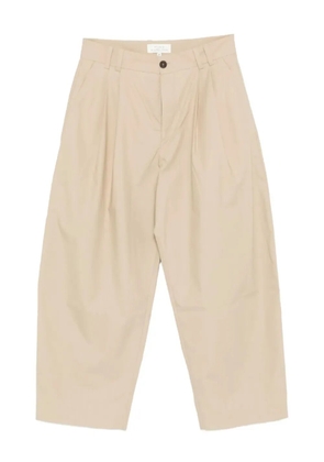 Studio Nicholson double-pleat trousers - Neutrals