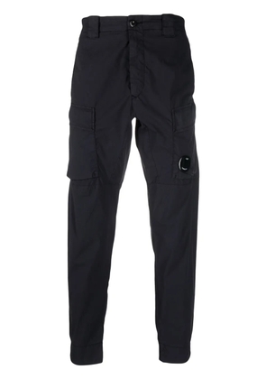 C.P. Company logo-patch tapered trousers - Blue