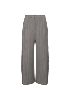 Pleats Please Issey Miyake pleated wide-leg trousers - Grey