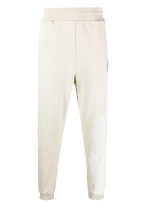 A-COLD-WALL* Brushstroke tapered track pants - Neutrals