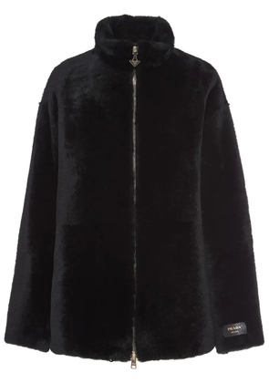 Prada logo-appliqué shearling jacket - Black